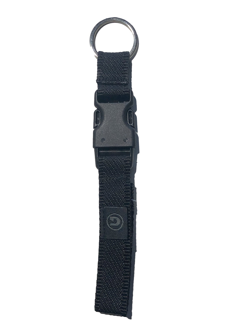 Detachable handcuff key holder for belt